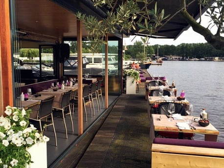 The restaurant also offers a cosy waterside terrace.