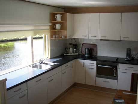 Open, fully equipped kitchen