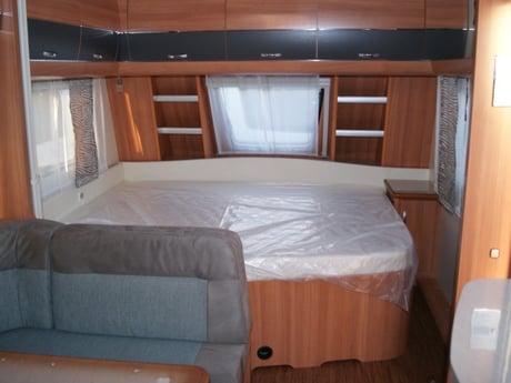 Comfortable double bed for a good night rest after a great day on the water.