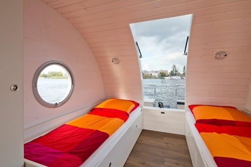 The two single beds on the top deck can be transformed into a double bed.