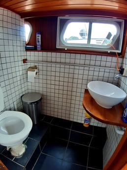 Toilet and shower cabin