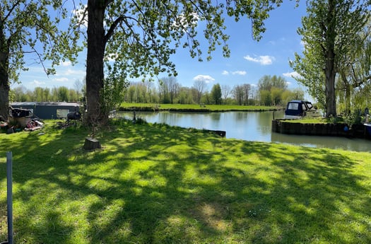 A view of the river from the seating area on the boat