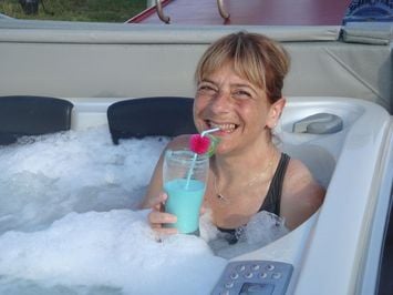 Enjoying a cocktail in the jacuzzi