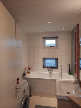 Bad in de badkamer.