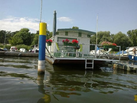 The terrace of the   Houseboat offers a great view over the water.