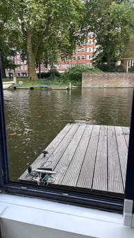 a spacious deck with a park view