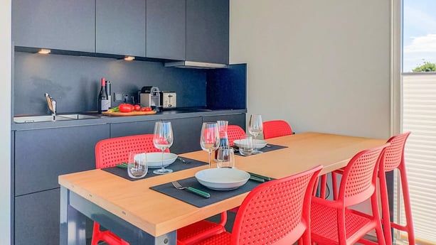 Kitchen table with adjustable height, working, eating.
