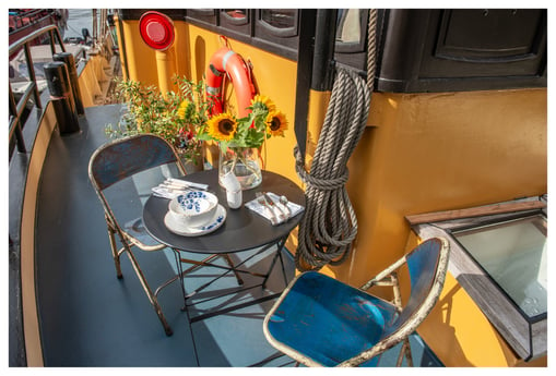 Cozy sitting area in the sun on the deck.