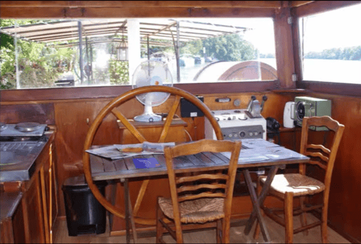 The wheelhouse gives a nice view over the terrace and water.