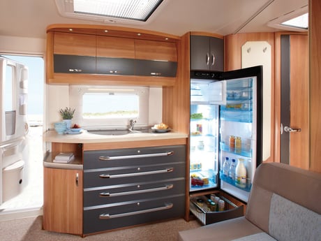 The kitchen is also  surprisingly spacious and has a large fridge