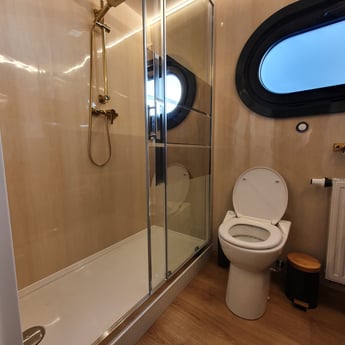 View of the bathroom, with a large showerspace!