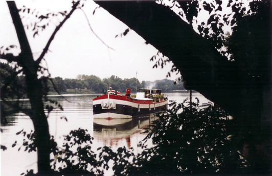 The houseboat is built on a traditional barge.