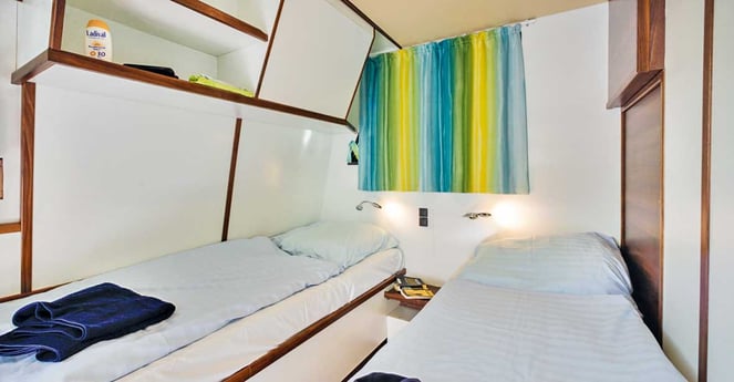 Comfortable beds in the cabin at the back.