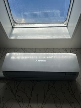Skylight above seating area. Air-conditioning keeps you cool in summer and warm in winter