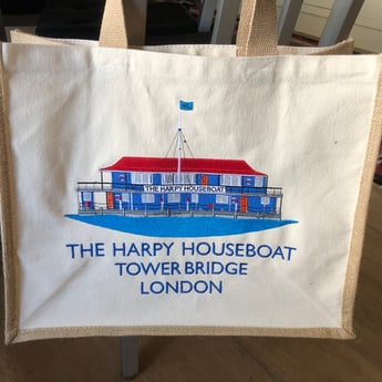 Harpy embroidered jute shopping bags.