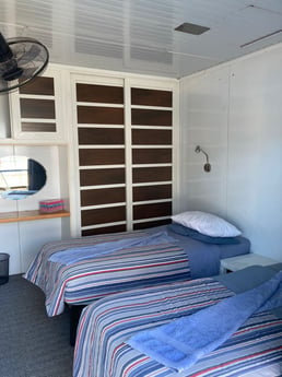 Cabina con camas individuales