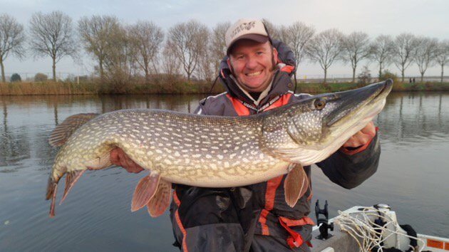 Giant pike caught near a houseboat in Amsterdam